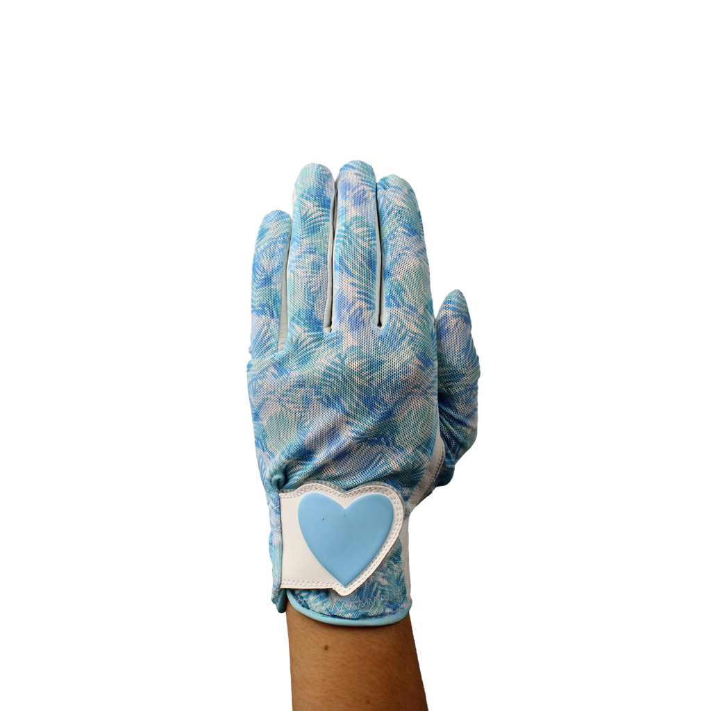 Ladies golf glove with a white and teal tropical frond design