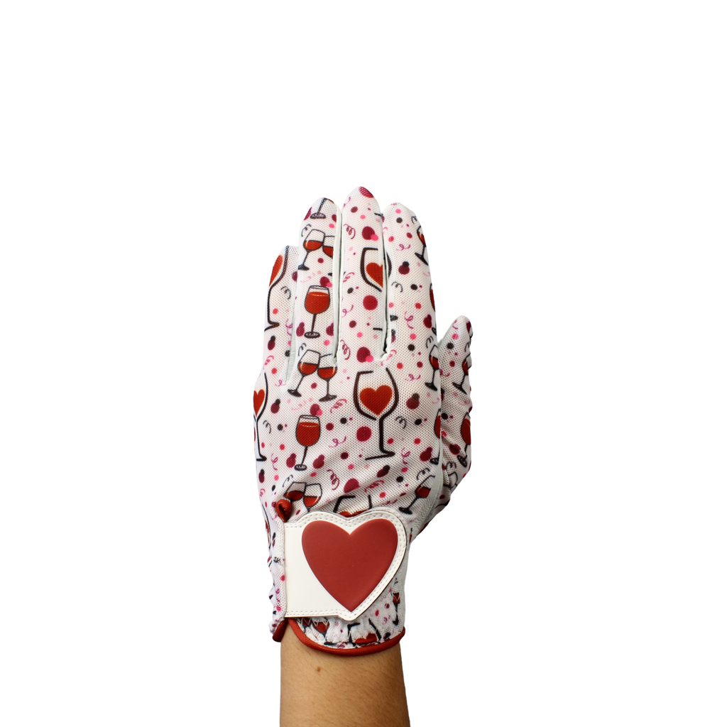 Ladies golf glove with wine glasses and red hearts